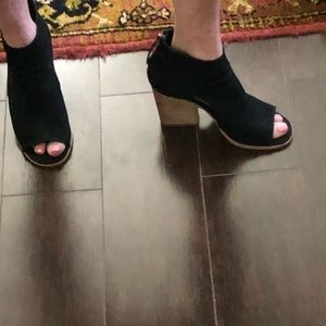 Peep toe ankle booties cut outs on both sides black. Vince Camuto